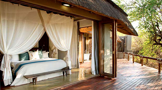 Little Madikwe Hills - Madikwe Game Reserve - Luxury Suite Bedroom opens onto Deck 