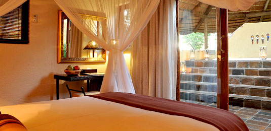 ustic Thatched Chalets - Tau Game Lodge - Madikwe Game Reserve