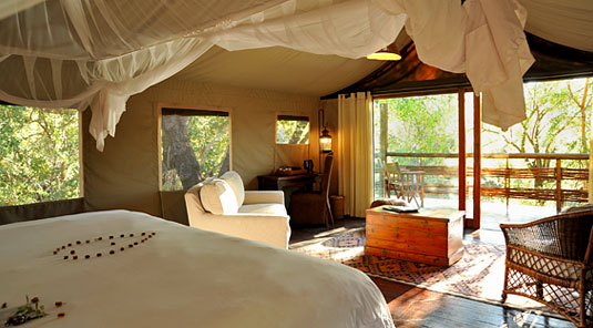 Thakadu River Camp - TSented Suite Bedroom & Deck - Madikwe Game Reserve